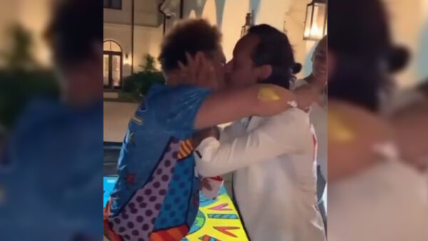 Marc Anthony Romero Britto beso