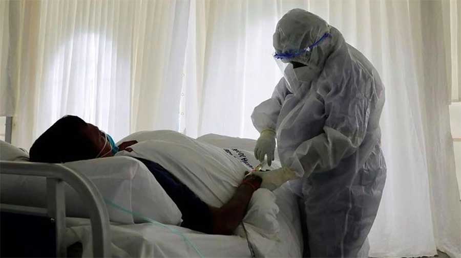 paciente covid cama medico