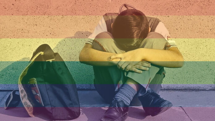 niño escolar deprimido